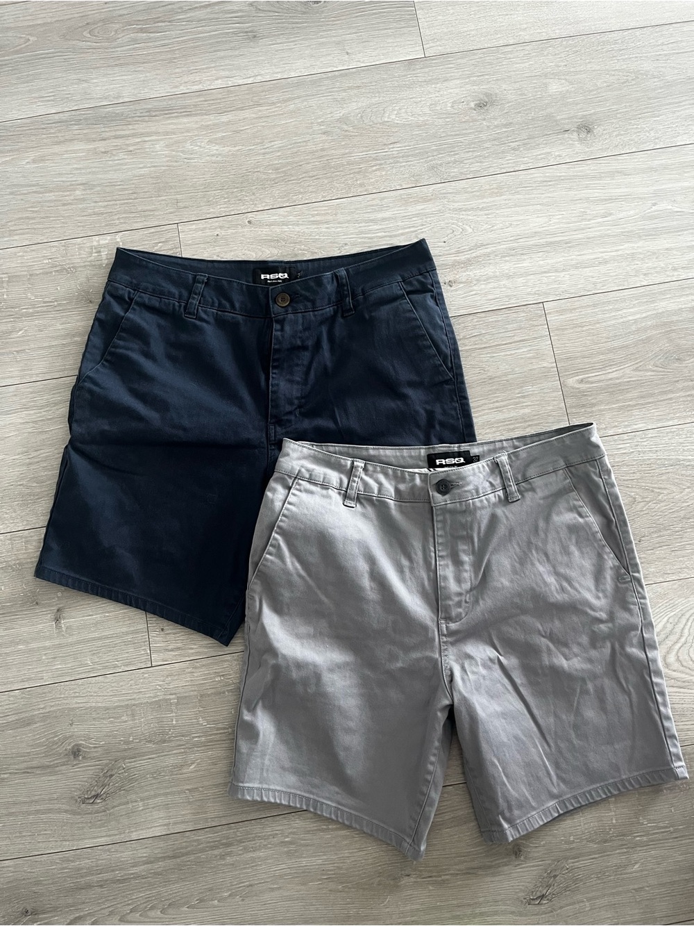 RSQ Men’s Flat-Front Shorts in Navy and Light Gray